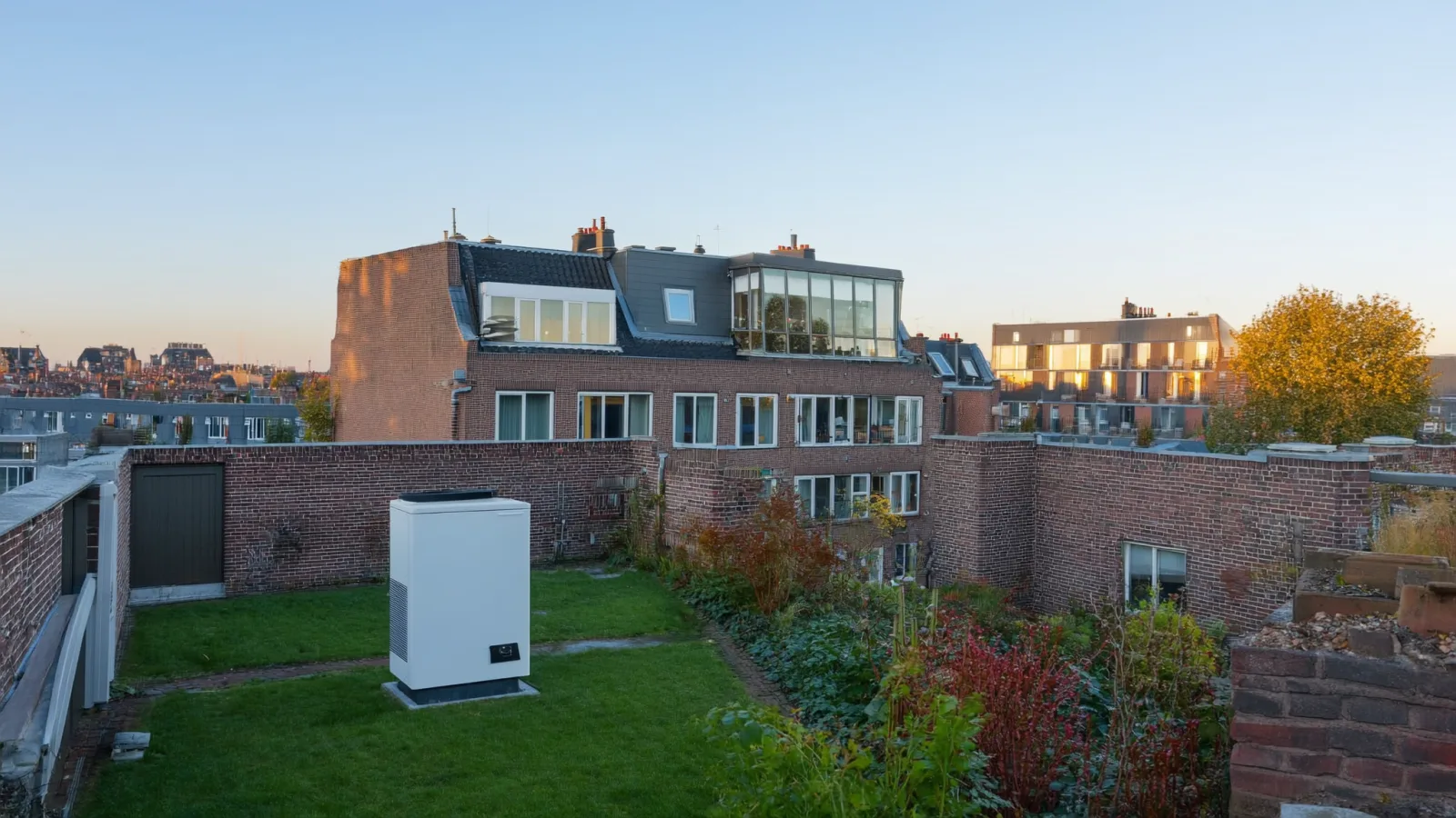 Warmtepomp platdak woning SCOP verschil installatie